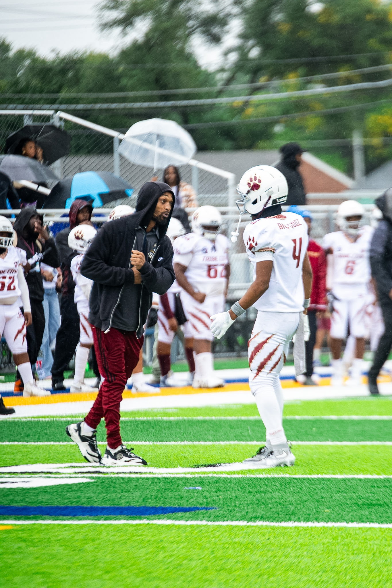 Coach Motion coaching football